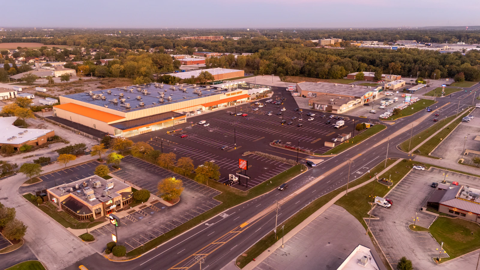 Dawn aerial view of Home Depot parking lots repaved and striped by Advantage Paving