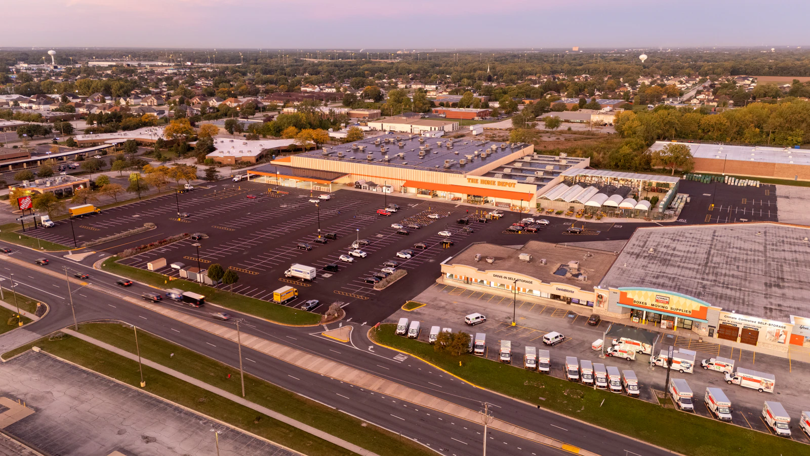Dawn aerial view of Home Depot parking lots repaved and striped by Advantage Paving