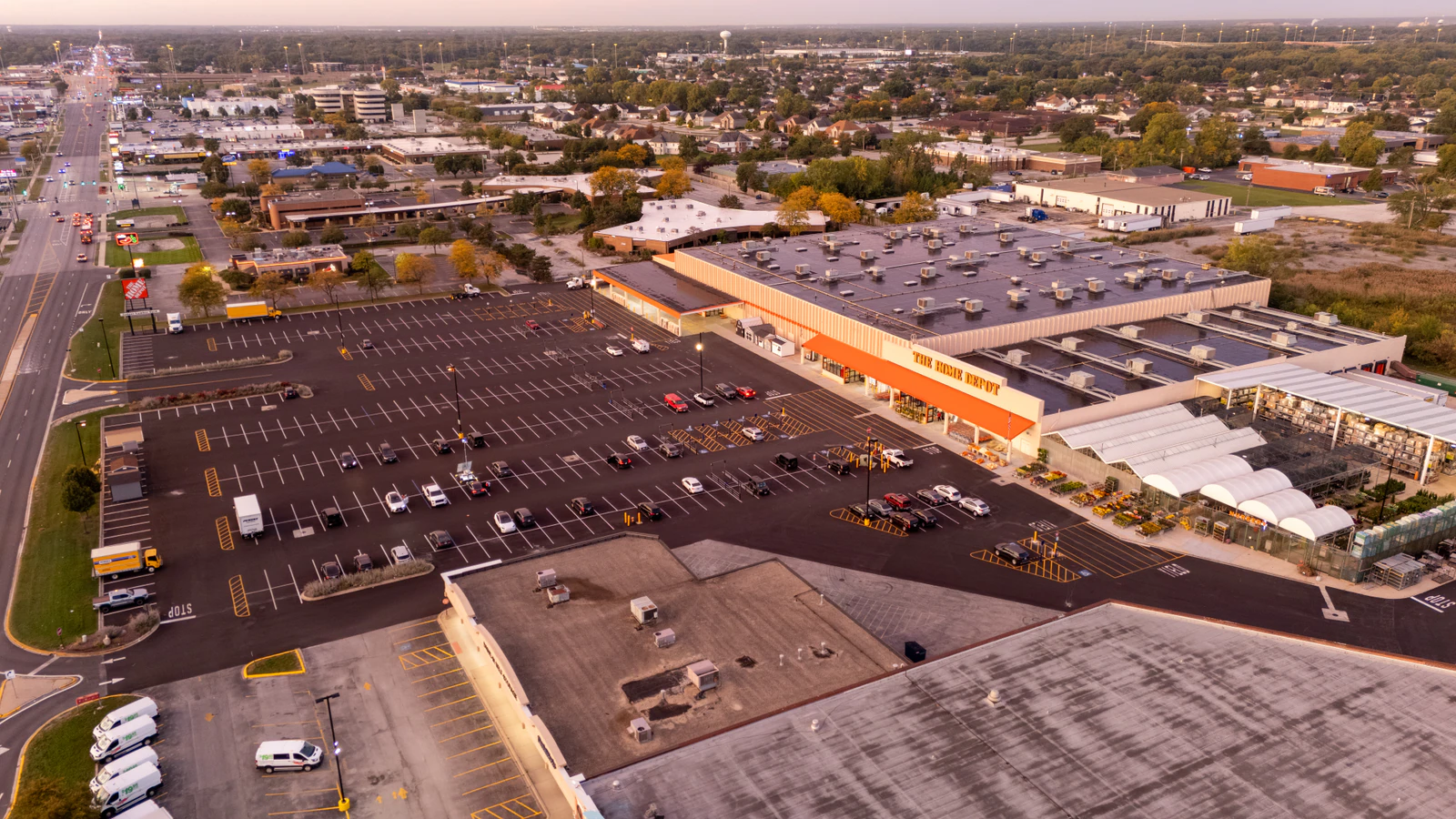 Dawn aerial view of Home Depot parking lots repaved and striped by Advantage Paving