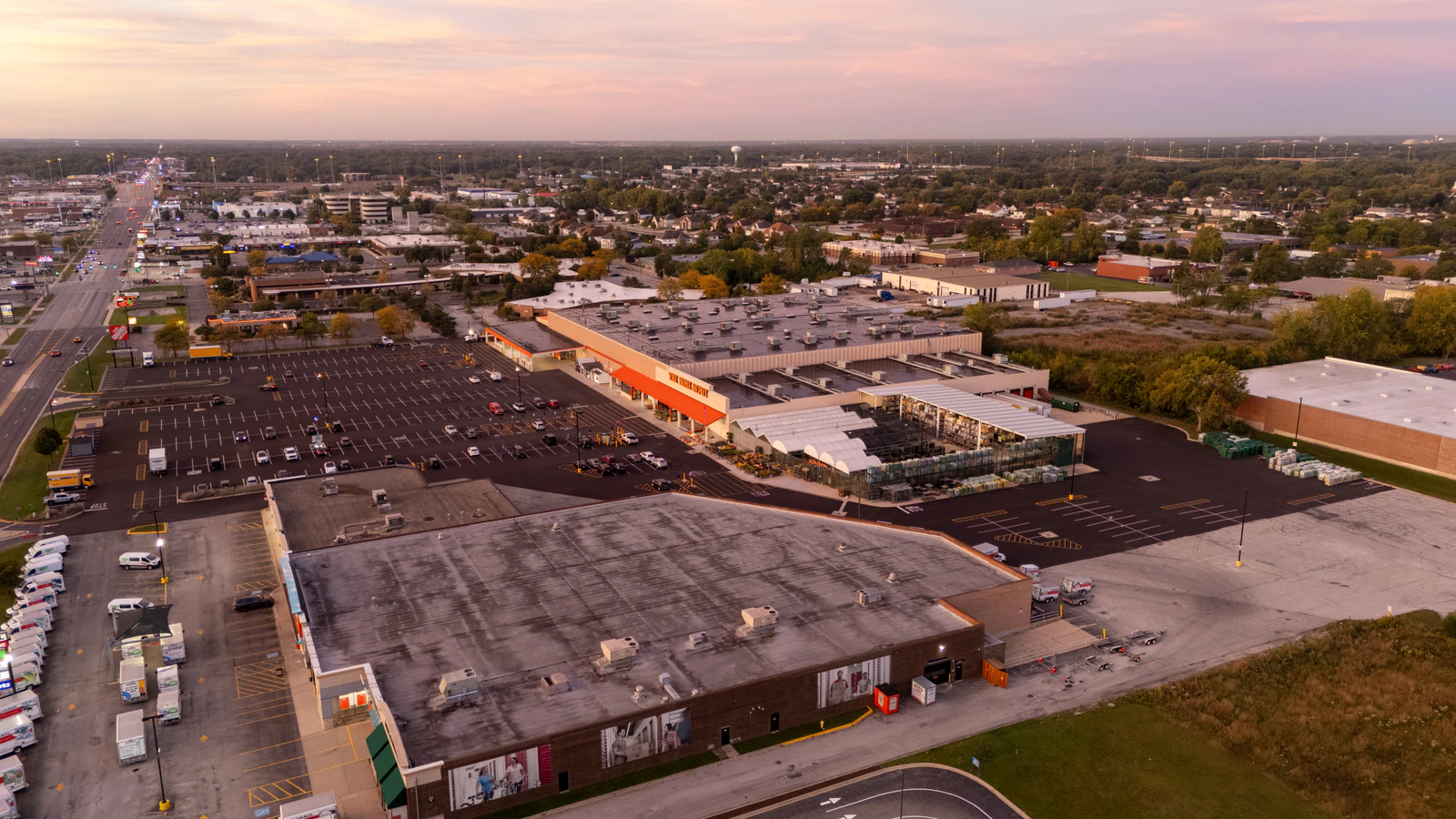 Dawn aerial view of Home Depot parking lots repaved and striped by Advantage Paving