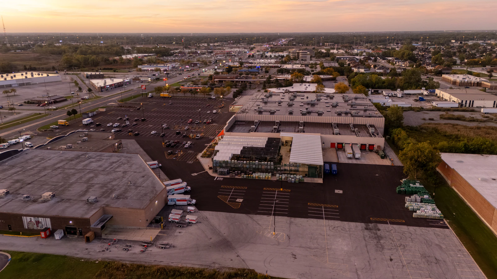 Dawn aerial view of Home Depot parking lots repaved and striped by Advantage Paving