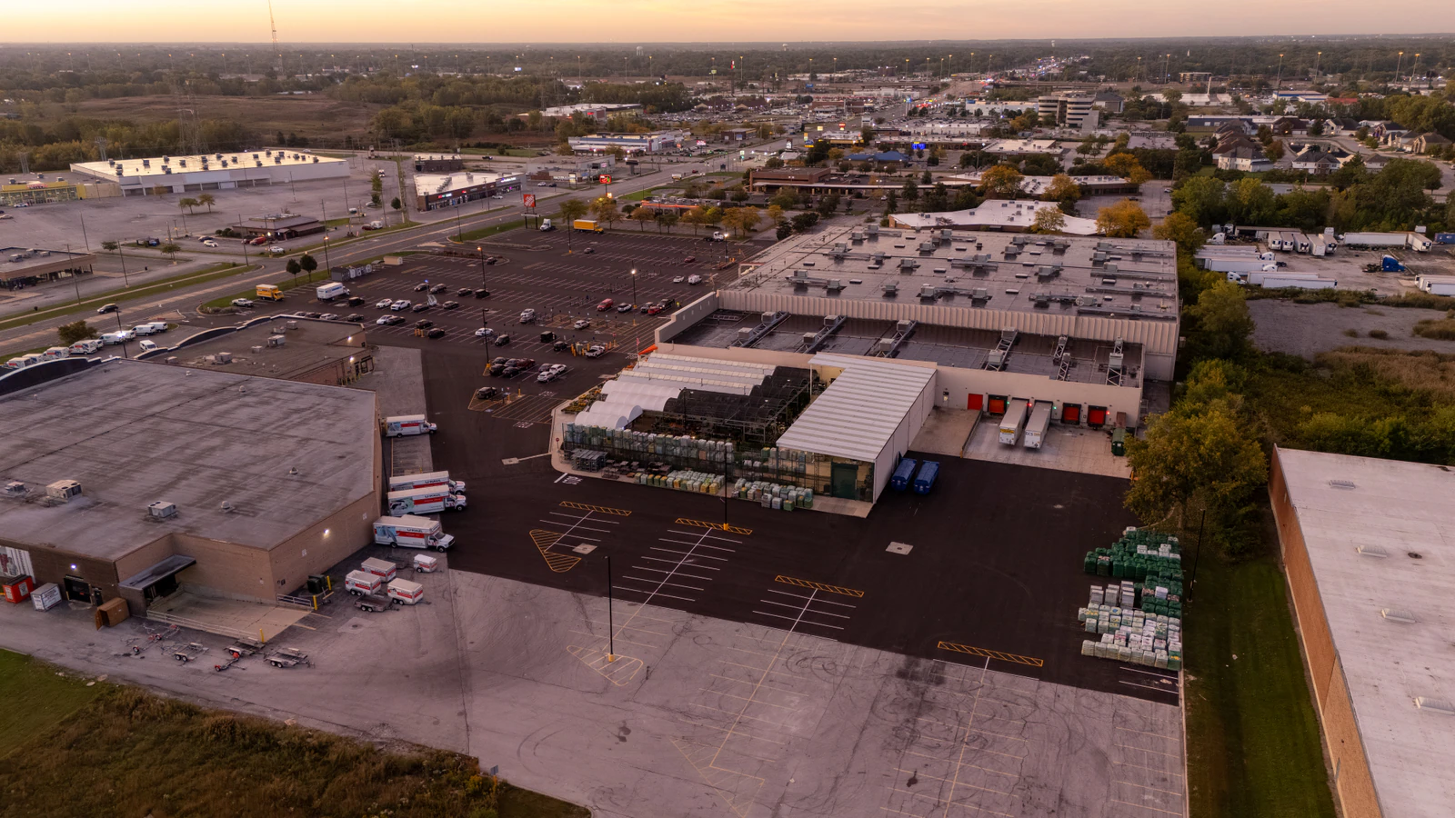 Dawn aerial view of Home Depot parking lots repaved and striped by Advantage Paving