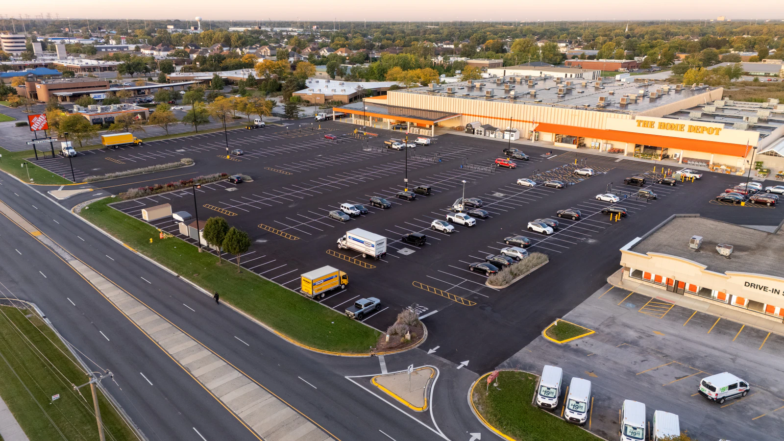 Dawn aerial view of Home Depot parking lots repaved and striped by Advantage Paving