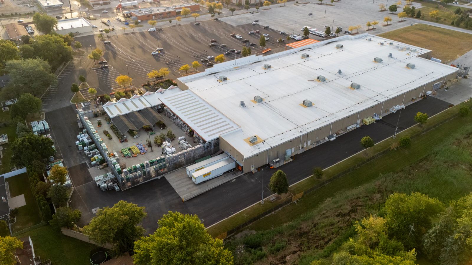 Dawn aerial view of Home Depot parking lots repaved and striped by Advantage Paving