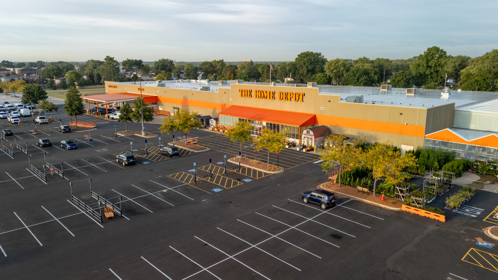 Dawn aerial view of Home Depot parking lots repaved and striped by Advantage Paving