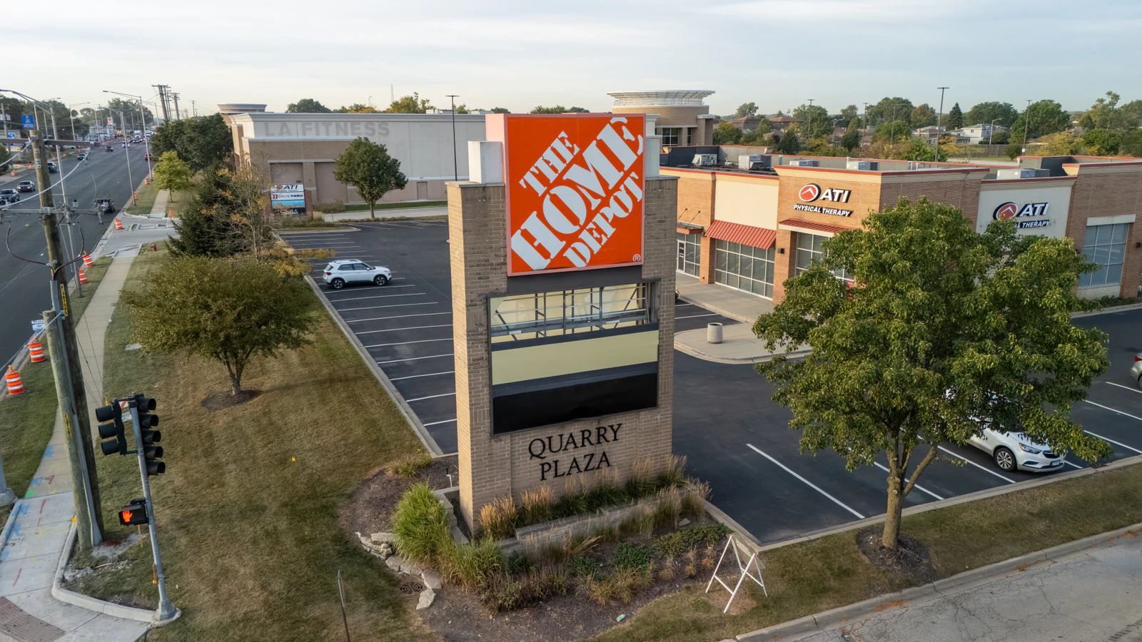 Dawn aerial view of Home Depot parking lots repaved and striped by Advantage Paving