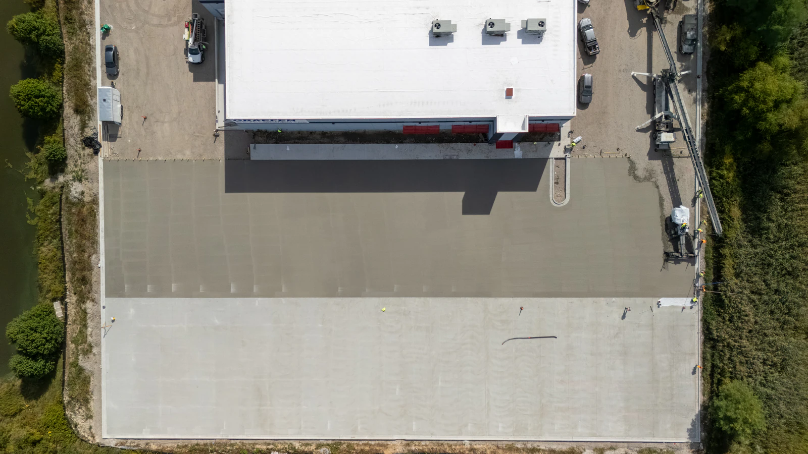 Rihm Kenworth truck dealership — excavation, grading and full-depth concrete parking lot construction by Advantage Paving