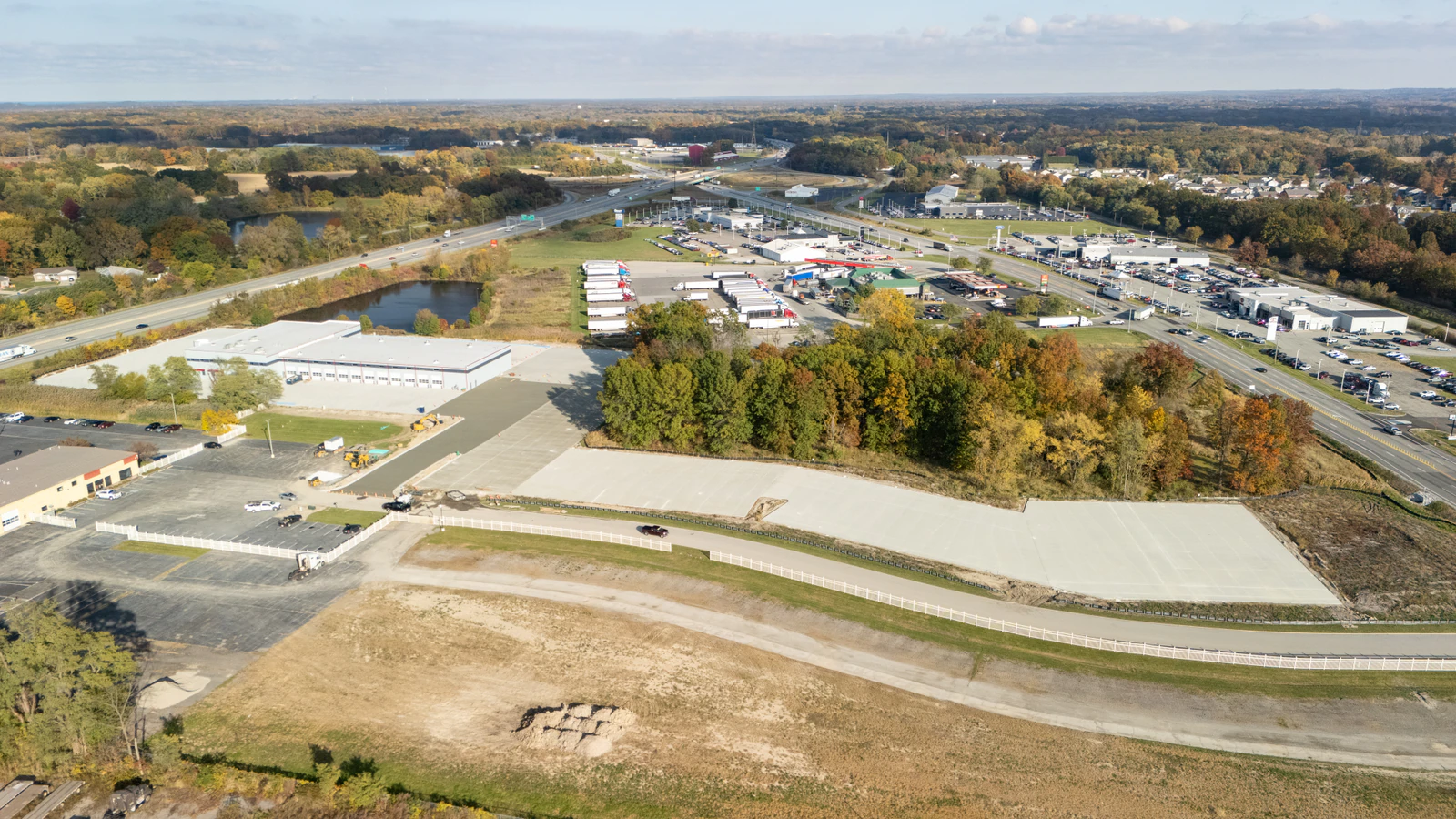 Rihm Kenworth truck dealership — excavation, grading and full-depth concrete parking lot construction by Advantage Paving