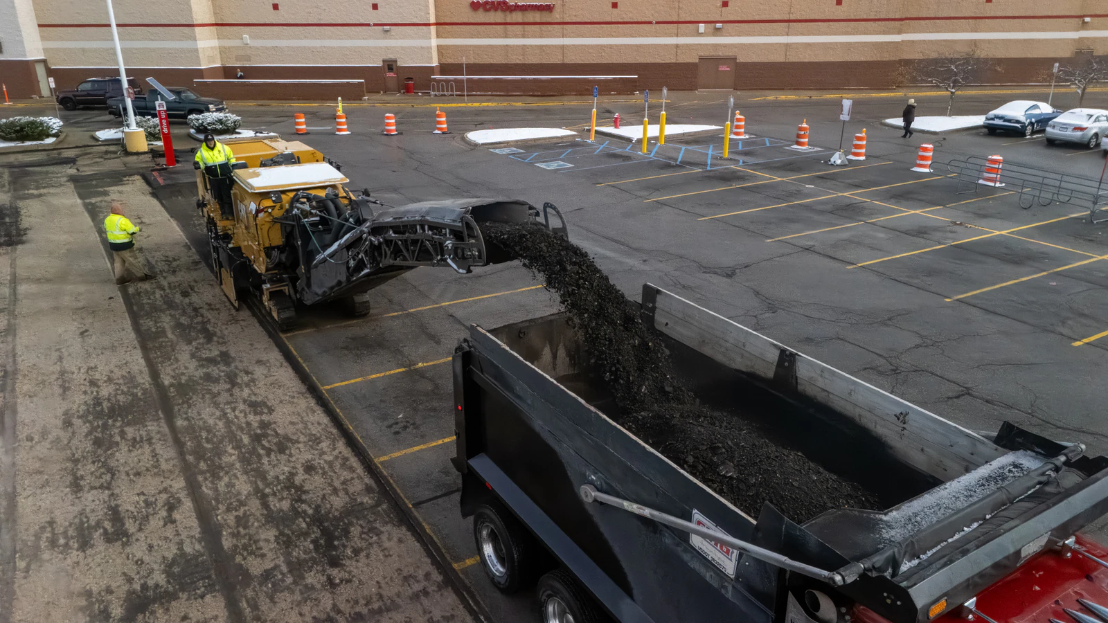 Target store emergency parking lot repair in Northern Indiana — milling, base repair, asphalt paving and striping by Advantage Paving