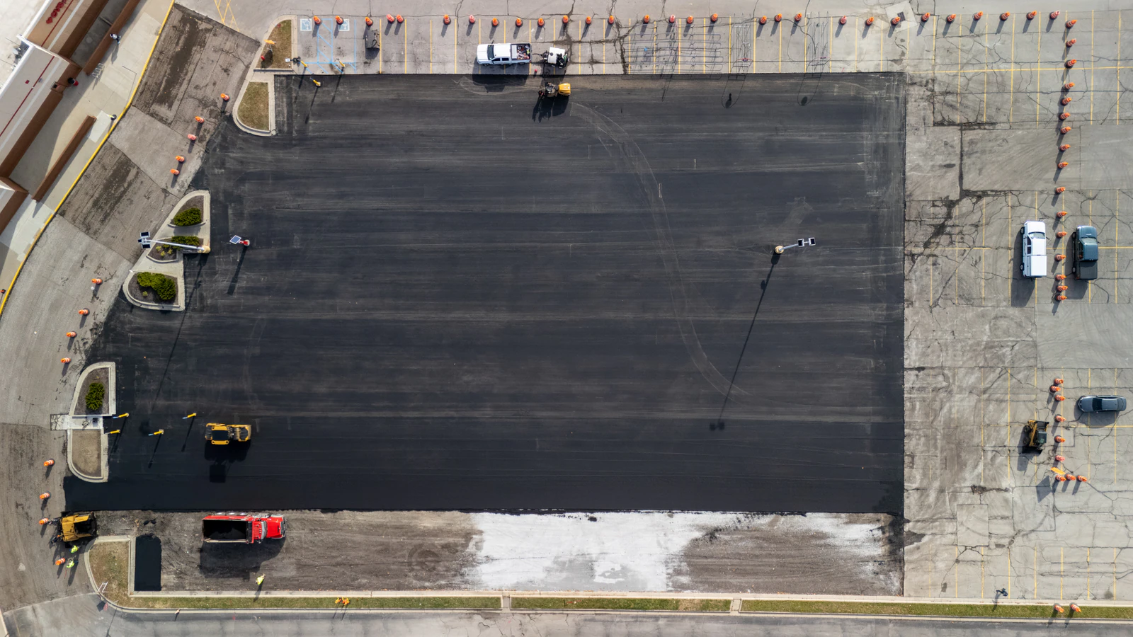 Target store emergency parking lot repair in Northern Indiana — milling, base repair, asphalt paving and striping by Advantage Paving