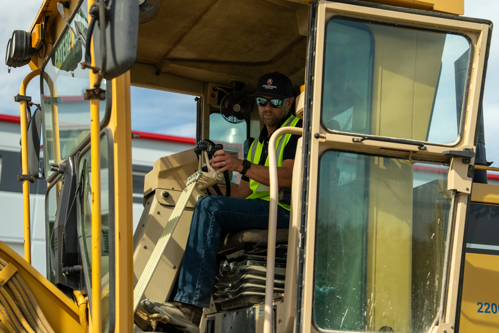 Rihm Kenworth truck dealership — excavation, grading and full-depth concrete parking lot construction by Advantage Paving