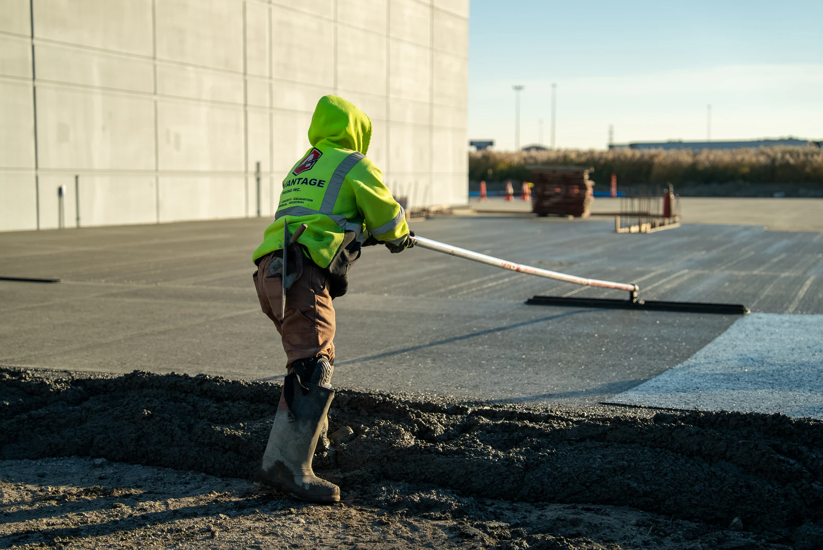 Rihm Kenworth truck dealership — excavation, grading and full-depth concrete parking lot construction by Advantage Paving
