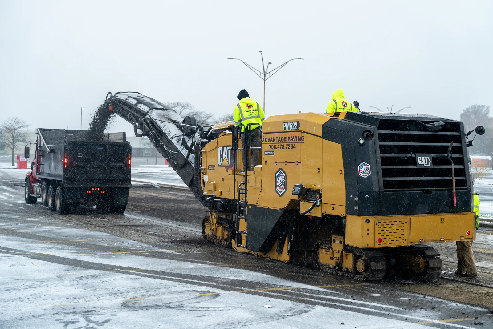 Target store emergency parking lot repair in Northern Indiana — milling, base repair, asphalt paving and striping by Advantage Paving