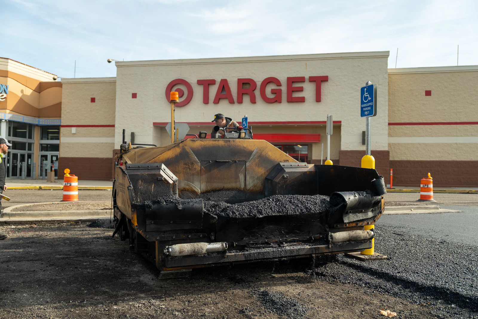 Target store emergency parking lot repair in Northern Indiana — milling, base repair, asphalt paving and striping by Advantage Paving